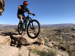 Chris Call mountain biking in the desert