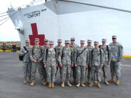 The Army ROTC cadets on their first day at the USNS Comfort. From left: Travis Cook, BYU; Stuart Cooley, BYU; Nathan Beck, BYU; Arianna Taylor, Westminster College; Benjamin Dagg, Wheaton College; Michael Ahlborn, BYU; Tanner Meloy, BYU; J. Patrick O’Donahue, BYU; Logan Cicotte, BYU; Daniel Cox, BYU; Spencer Barnes, BYU; and Lieutenant Colonel Dewey Boberg, BYU.