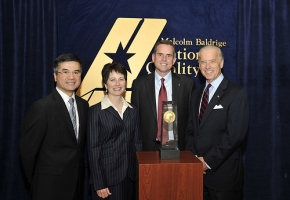 : From left: Commerce Secretary Gary Locke; Priscilla Nuwash, Director of Performance Excellence at PVHS; Rulon Stacey, CEO of PVHS; and Vice President Joe Biden.