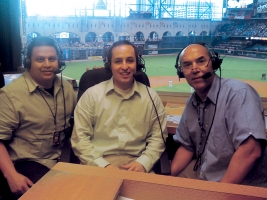 Finance student Chris Bernal sits in the press box with two announcers in Minute Maid Park during part of his internship with the Houston Astros. 