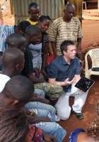 Jason Fairbourne consulting youth   entrepreneurs in Sierra Leone.