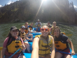 Group of students white water rafting