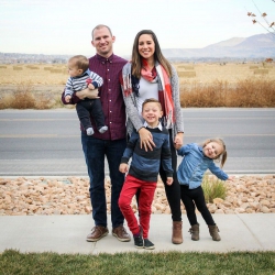Tyler Morgan poses for a family photo