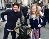 Sarah Agate and daughter in New York with statue