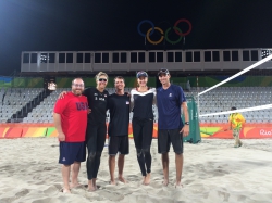 Vinci at the Rio Olympics on staff with USA women's beach volleyball team April Ross and Kerri Walsh Jennings.
