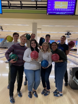 Keller and some friends go bowling on BYU campus