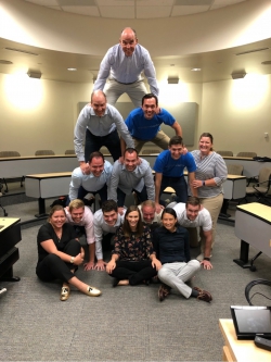 The 2019 cougar capital team forms a human pyramid