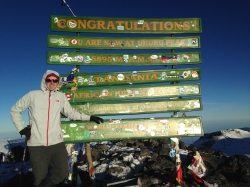 Orrin Hancock at the summit of Mt Kilimanjaro
