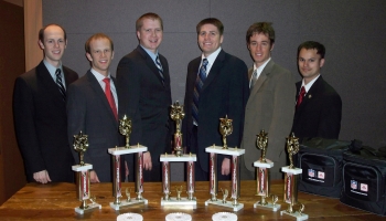 From L to R: Reed Olsen, Dave Wilson, Robert Mount, Devin Collier, Landon Cope and Bryce Clark stand with the awards they won at the competition.