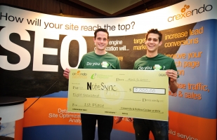 Master of information systems management students Brady White (left) and Kyle Klein (right) won both the $8,000 first-place prize and the audience choice award for NoteSync at the Crexendo Online Marketing Competition.