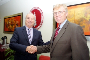 Jorge Talavera, president of ESAN University, and Lee Radebaugh, director of the Whitmore Center, seal the agreement between BYU and ESAN. The Escuela de Administración de Negocios in Lima, Peru, is one of the newest options offered by the GMC as an option for exchange students.