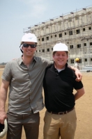 Lewis Hower (right), executive director of the University Impact Fund with Beau Seil (left), Ballard Center board member and a UIF adviser, on site at an affordable housing project in India.