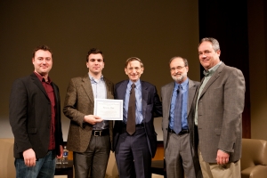 From left: SSE co-directors Adam Norton and TJ Thomander receive the “Award for Innovation in Social Entrepreneurship Education” from Bill Drayton, Gregory Dees, with Todd Manwaring.